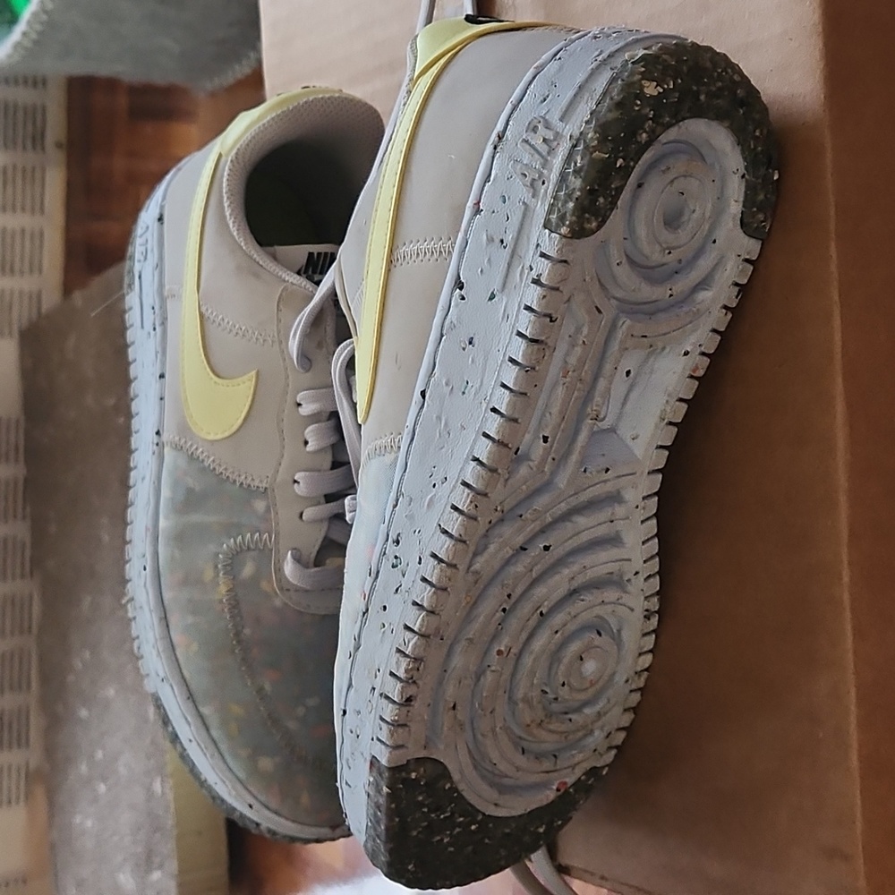 Nike Women's Sneakers Light Gray with Pale Yellow Swoosh